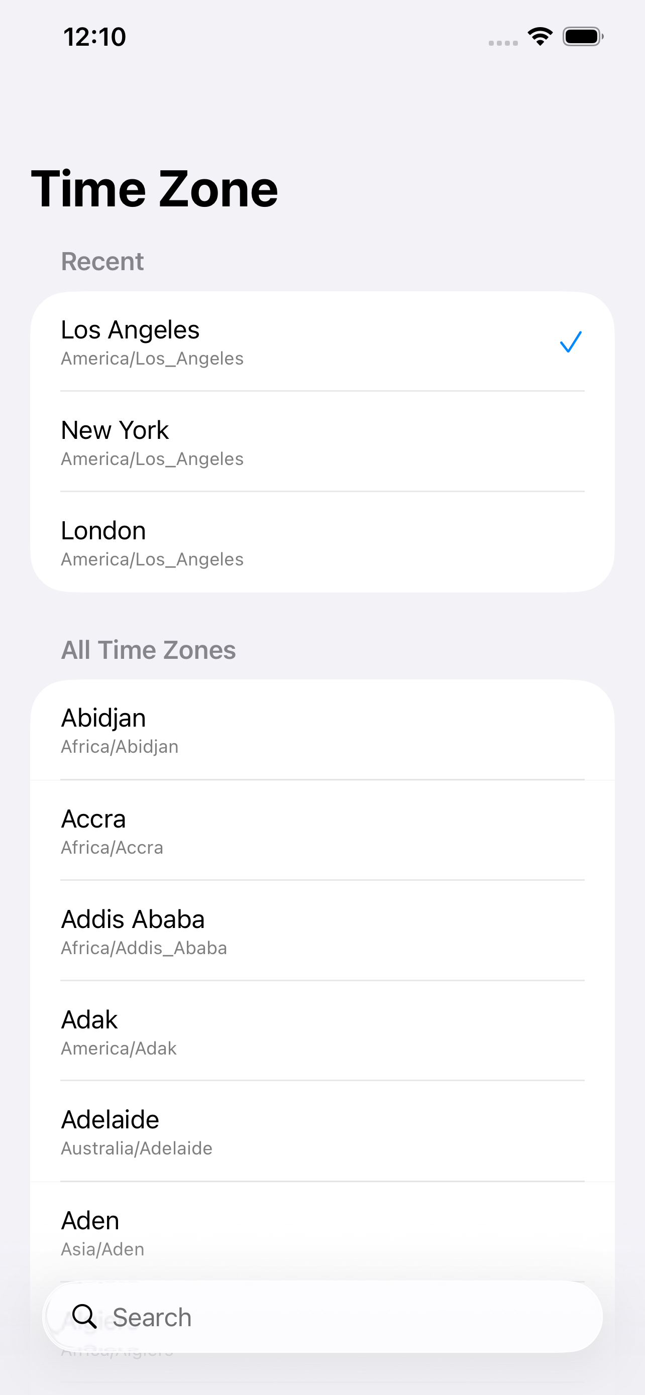 Time zone picker showing recent zones and a full alphabetical list of cities