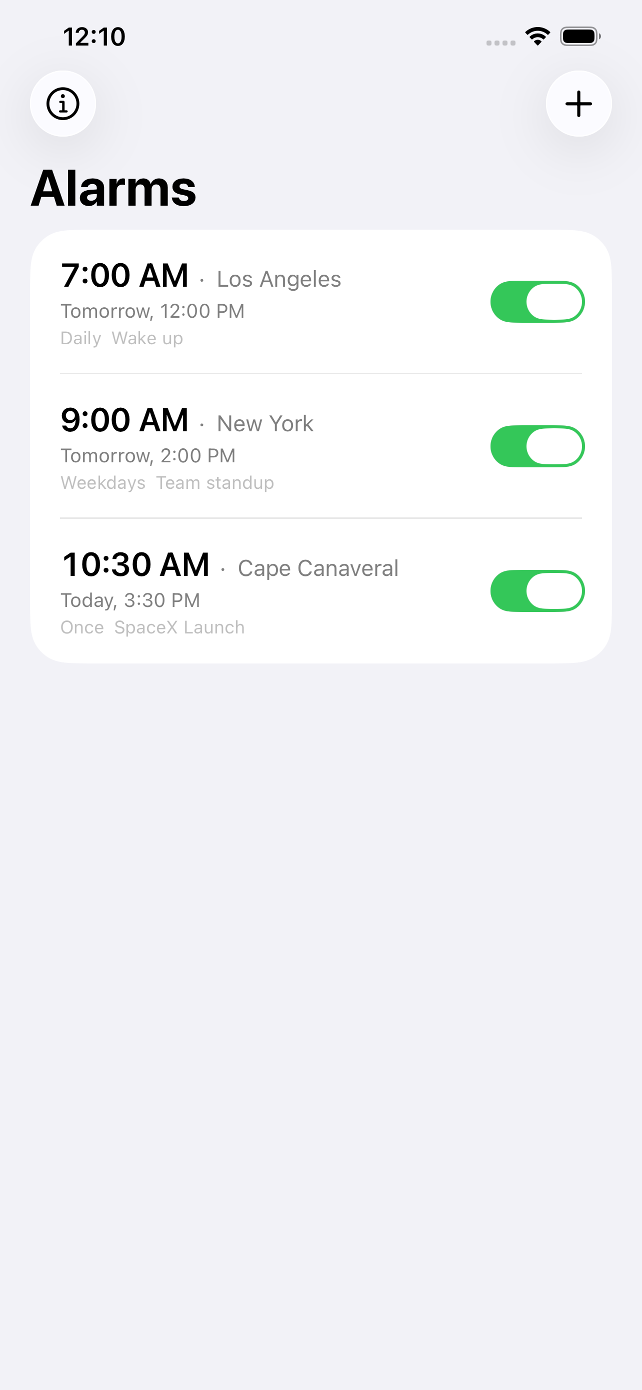 Alarm list showing alarms for Los Angeles, New York, and Cape Canaveral with next-fire times in the device's local time