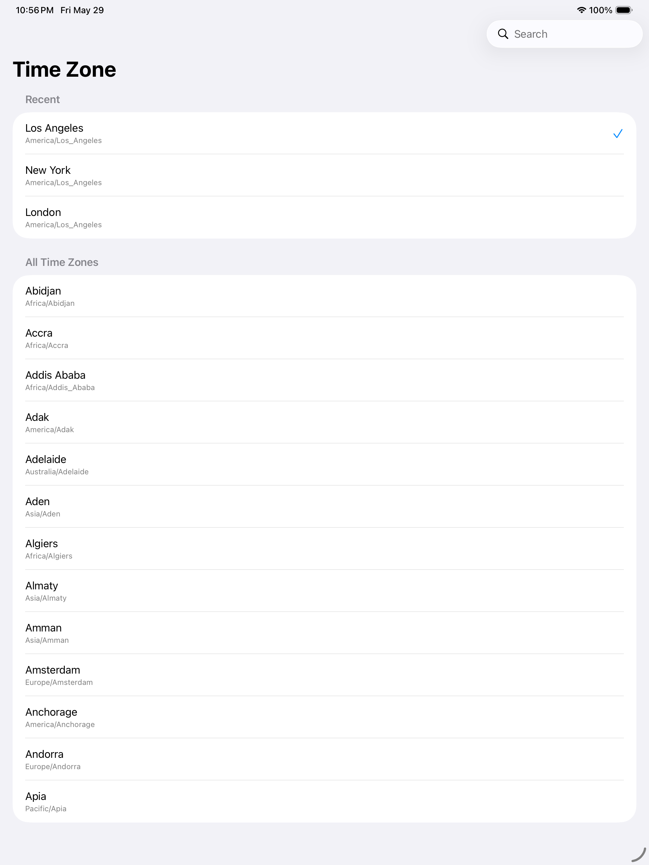 Time zone picker showing recent zones and a full alphabetical list of cities
