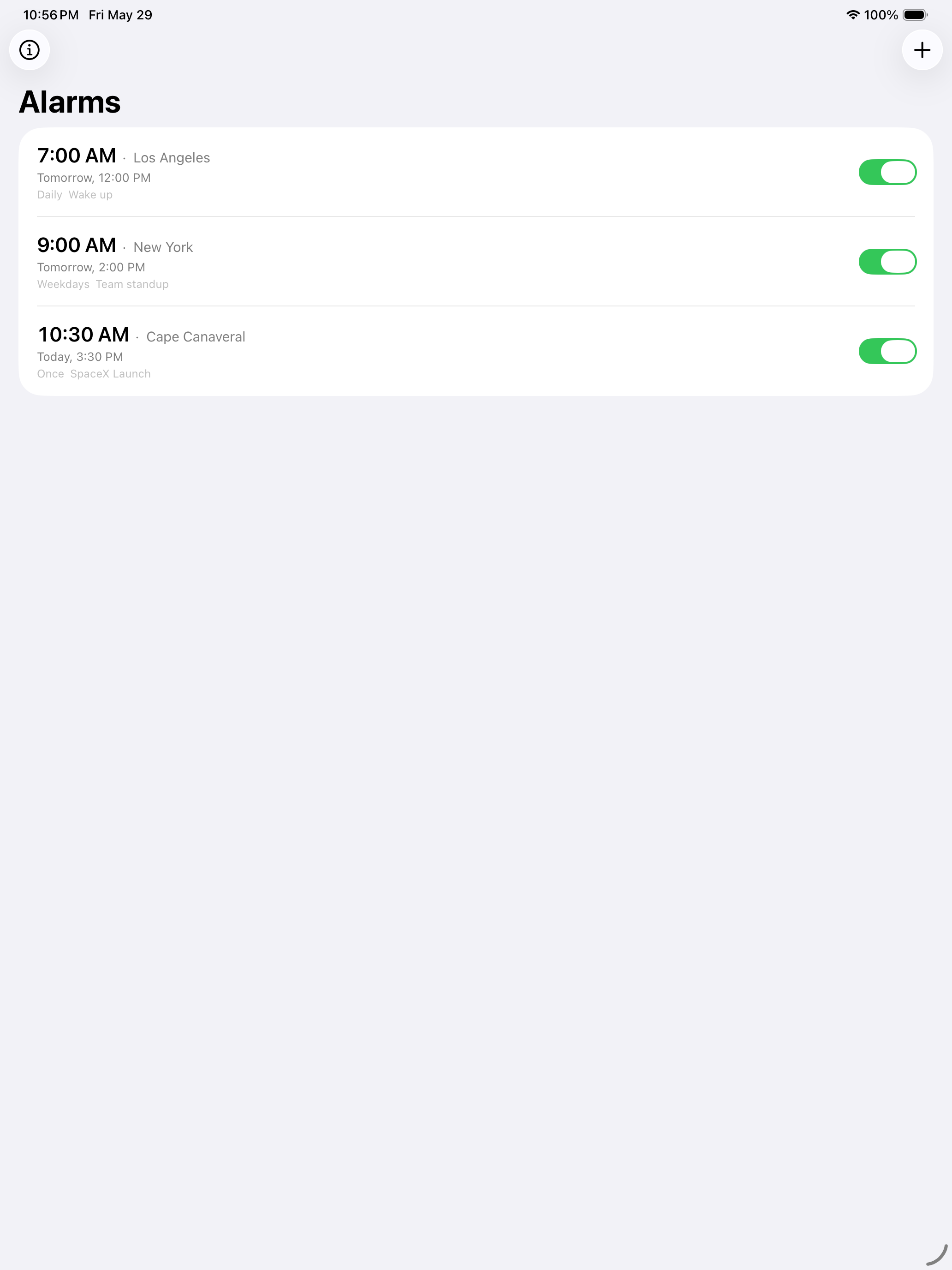 Alarm list showing alarms for Los Angeles, New York, and Cape Canaveral with next-fire times in the device's local time