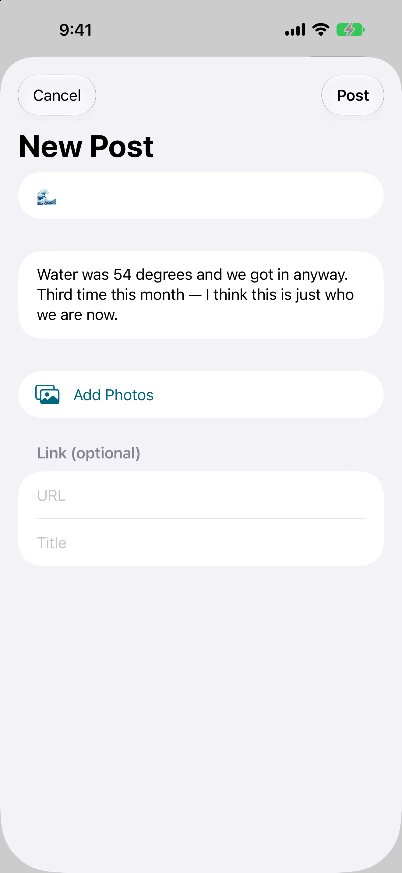 Composing a post on iPhone: a single emoji is required, with optional text, photos and a link.